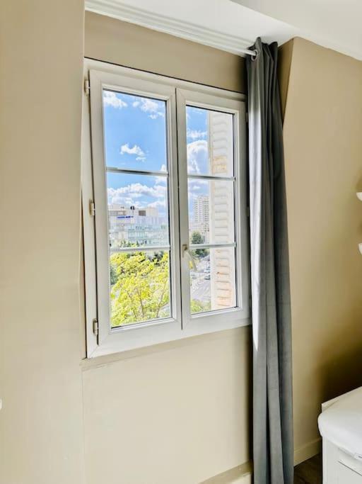 Appartement Vue Tour Eiffel Ligne 14 A Cote De Paris Gentilly Exterior foto